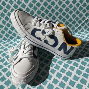 White, blue , yellow Converse shoes size 3.5